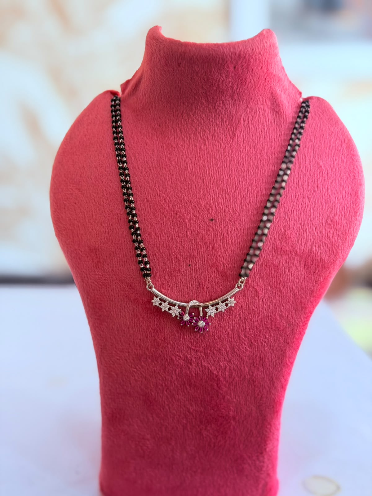 Silver Floral Mangalsutra – Double Line Black Beads with CZ & Ruby Pendant